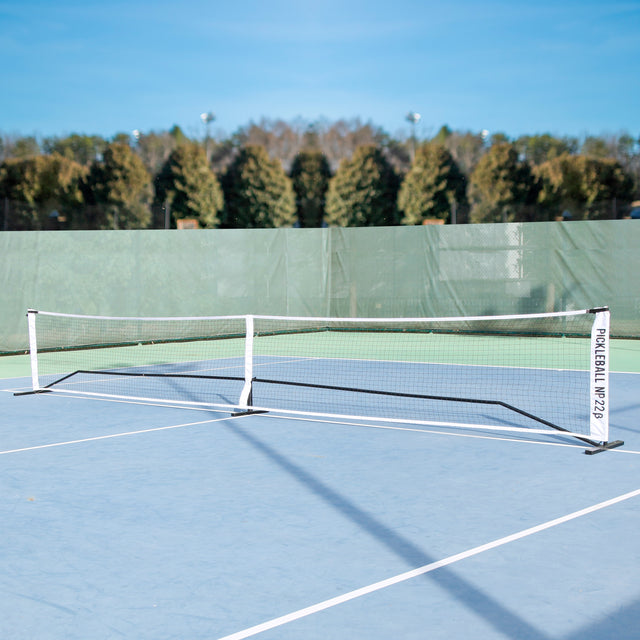 FULL SIZE PICKLEBALL NET | ADVANCED PLAYZ lifestyle image, NET PLAYZ, NetPlayz, Sports Equipment Supplier, Sports Training Equipment Supplier, sports equipment manufacturers, USA, Canada, tennis training equipment, tennis training device, tennis training accessories, tennis equipment training, tennis practice equipment, tennis equipment for practice, tennis practice accessories, tennis practise equipment, tennis training aids, padel training equipment, pickleball training equipment